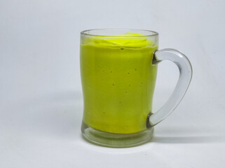 Jus Alpukat or Avocado Juice. Served in glass on white background.