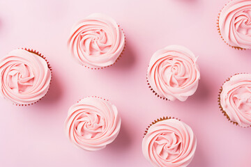 Top view of romantic Valentine cupcakes with light pink buttercream shaped like a rose