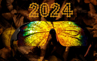 autumn forest reflections in sport rainbow cycling glasses with 2024 Happy New Year made from...