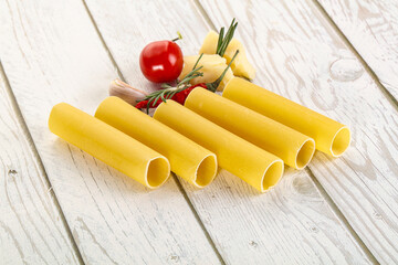 Raw uncooked Italian pasta Cannelloni
