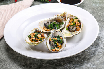 Open half oysters with green onion