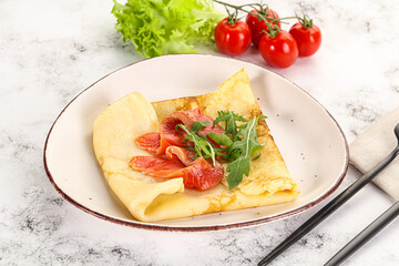 Russian pancake with salmon fish