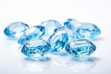 Precious blue sapphire crystals on white background