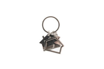 Keychain in the shape of a house with a key ring isolated on a white background. Concepts for real...