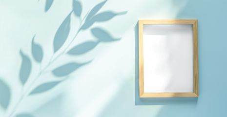 Minimalist blank picture frame mockup poster on blue background with leaf shadow. Empty frame with reflection, transparency isolated.