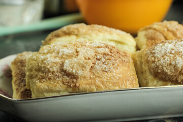 Puff pastry pie sprinkled with sugar.