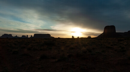 Red sunset against the backdrop of red sandstone rocks, Monument Valley, Arizona