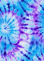 A cotton tie dyed fabric with purple and blue patterns, in the style of spiral group, light sky-blue and dark magenta