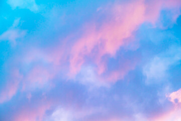 Blue morning sky is in pink clouds. Sunrise clouds are in vanilla colours. Beauty in nature....