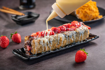 Fried Sushi Brazilian style. Strawberry sushi dog. © marcelokrelling