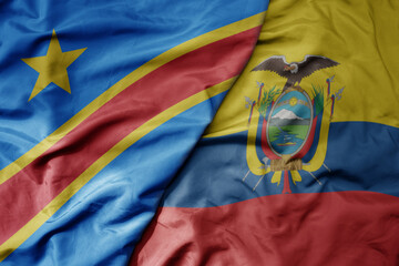 big waving national colorful flag of ecuador and national flag of democratic republic of the congo .