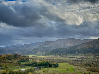 Naklejka premium The landscape of Carpathian Mountains in the cloudy weather. Perfect weather condition in the spring season