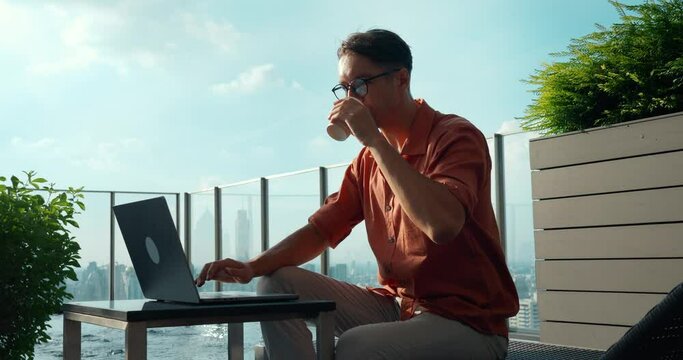 Freelancer works on laptop outdoors embracing freedom of remote work This freelancer exemplifies modern lifestyle earning well anywhere. Freelancer's life blend of travel work liberty.