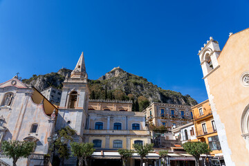 View from Taormina's Belvedere toward the mountain behind it, the castle, the bell tower and facade...