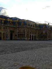 Fototapeta na wymiar Versailles, September 2023 - Visit the magnificent Palace of Versailles. Home of kings built by the Sun King Louis XIV View of the castle