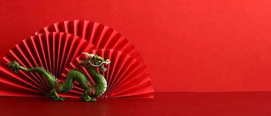 Foto op Plexiglas Chinese New Year 2024 banner template with dragon and paper cut fan decoration on red background. © photoguns