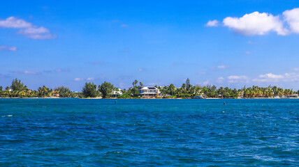 Beautiful view of Grand Cayman, Cayman Islands in the Caribbean with pristine beach turquoise blue green water sea ocean