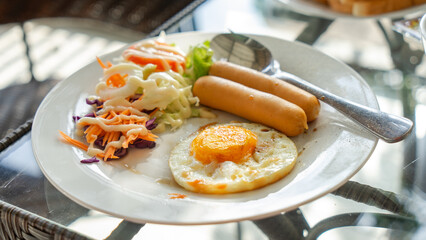 Classic breakfast photos american style Thick, round, beautiful fried eggs Cooked egg yolk dripping...