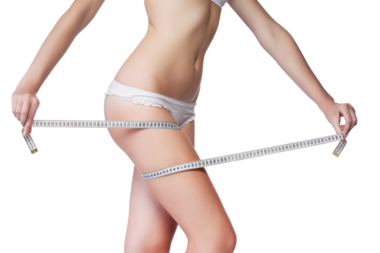 Woman measuring her thigh, isolated