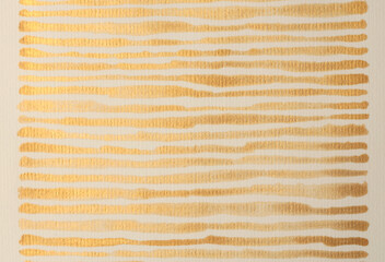 Gold nacre glitter ink watercolor wave line strip stain blot on beige grain paper texture...
