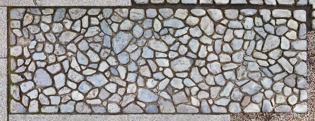 Old Japanese-style cobblestones. Photographed from above.