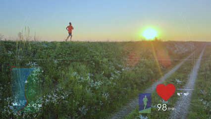 Health application overlay HUD with data on distance and heart rhythm digitally embedded over a sporty athlete during running training