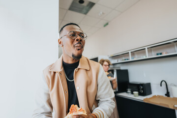 In the work hustle, a black male enjoys a pizza break, slices of joy bringing a tasty twist to the routine, a moment of delicious respite.