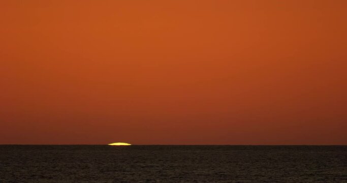 4K sunrise dawn daybreak sunup timelapse. Giant huge large sun clear sky pure cloudless bright golden nature morning. Spectacular radiant light time lapse
