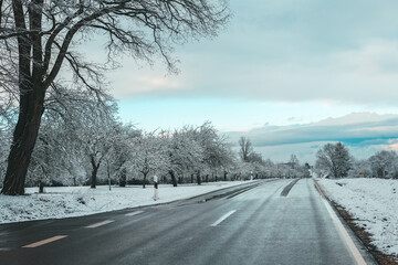 Fototapeta premium Ice on the road.Ice on the road. Slippery winter road. Road traffic in winter.