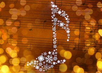 Music note made of snowflakes against sheet with musical symbols. Bokeh effect