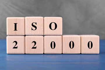 International Organization for Standardization. Cubes with abbreviation ISO and number 22000 on...