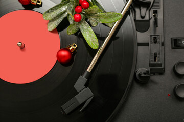 Festive Christmas decoration on vintage vinyl record player