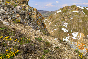 Beautiful landscape with hills and rocks. Background with selective focus and copy space