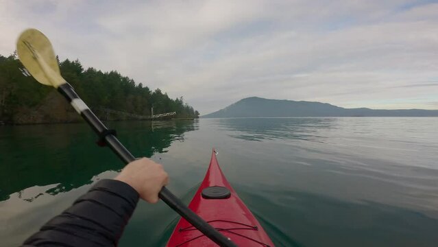 Man Kayaking in the Morning on Calm Ocean Waters. Winter. Victoria, Vancouver Island BC Canada