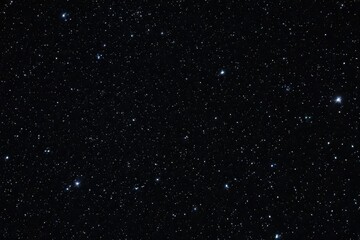 a high quality stock photograph of a single universe sky dark black with shiny stars