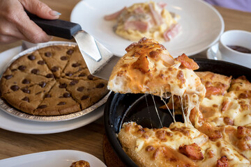 Top view, Pizza and other fast food on wooden table