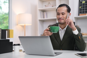 Close up of happy smile businessman holding smartphone in office for online chat message communication. Using mobile phone in workplace electronic transactions, shopping online. Focus at mobilephone.