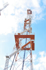 Naklejka premium Telecommunication tower against the blue sky