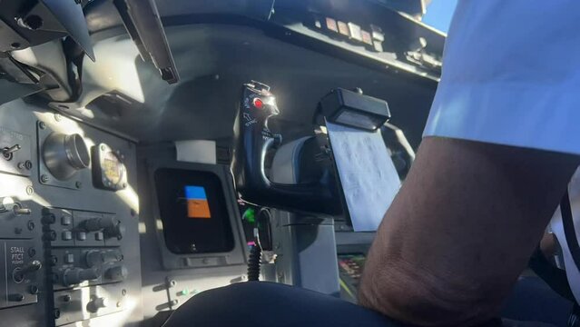 Airplane cockpit scene during a real flight, timelapse.