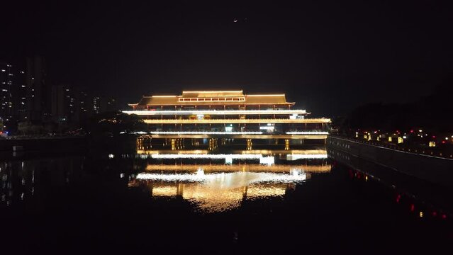illuminated architecture near water 