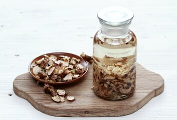 Tincture from fresh roots of  Rhodiola rosea,  commonly known as  golden root, rose root, Arctic...