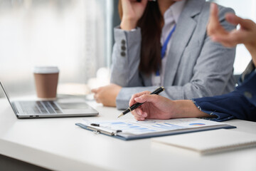 Two Asian businesswomen working together, meeting and discuss of new business project, professional people.