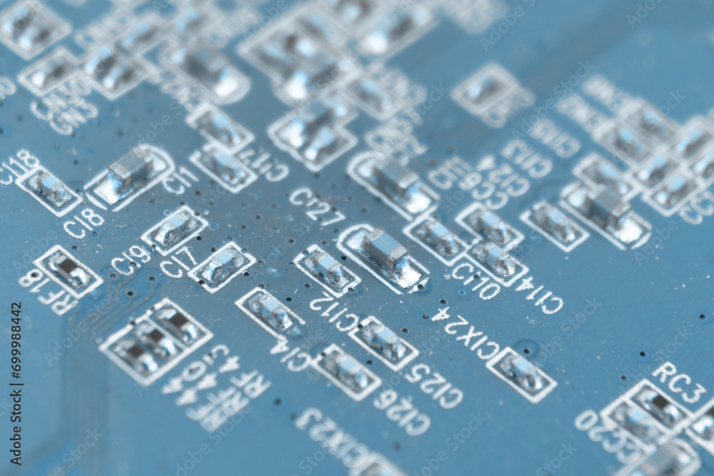 Poster circuit board with resistors microchips and electronic components background. computer hardware tech