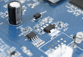 Macro shot of Circuit board with resistors microchips and electronic components background....