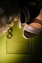 Bride's shoes and wedding rings