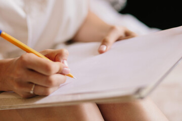 The bride is writing a letter