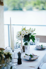 Fototapeta na wymiar Wedding guest cards on table with flowers