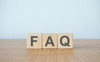 wooden blocks with the word FAQ frequently asked questions