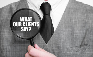 WHAT OUR CLIENTS SAY on magnifying glass and businessman