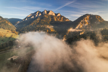 An aerial view of the autumn Pieniny Mountains captured on an October morning. Mists and low light add charm to this landscape.
